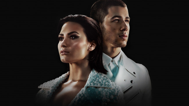 Обои картинки фото музыка, -другое, знаменитости, nick, jonas, demi, lovato, деми, ловато, черный, фон, певцы, ник, джонас