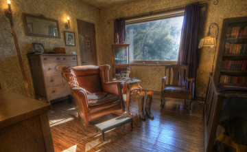 Картинка интерьер кабинет библиотека офис сапоги стелажи кресло