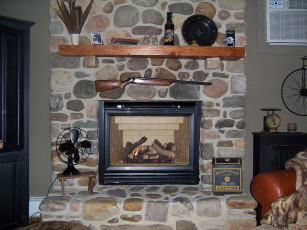 Картинка интерьер камины вентилятор камин ружье