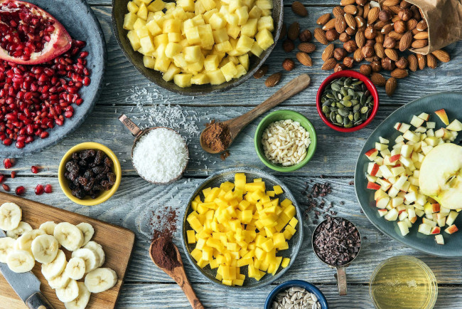 Обои картинки фото еда, разное, фрукты, рис, орехи, гранат