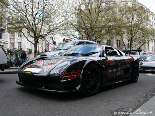 Картинка автомобили выставки уличные фото