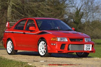 Картинка автомобили mitsubishi lancer gsr evolution vi красный cp9a uk-spec edition tommi mаkinen