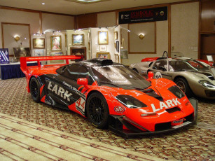 Картинка автомобили выставки уличные фото