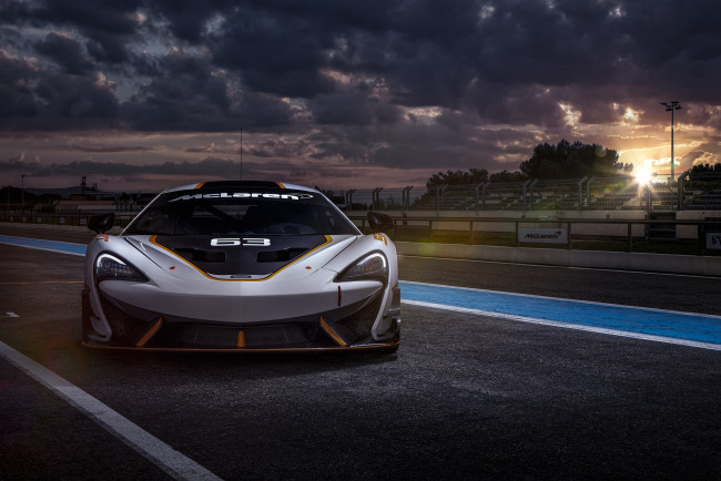 Обои картинки фото автомобили, mclaren, стадион, закат
