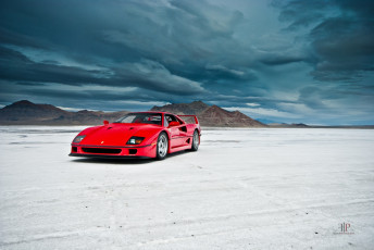 Картинка автомобили ferrari облака красный берег