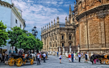 Картинка города севилья+ испания севилья карета люди дома мостовая