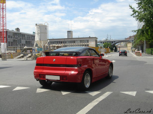 Картинка автомобили выставки уличные фото