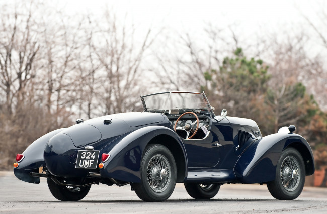 Обои картинки фото aston-martin jaguar c type roadster 1959, автомобили, классика, jaguar, aston-martin, 1959, roadster, type, c