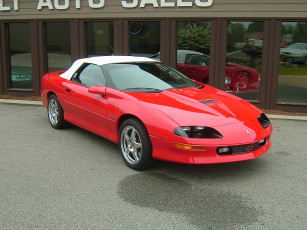 Картинка автомобили выставки уличные фото