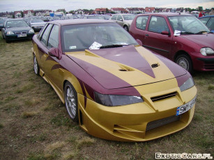 Картинка автомобили выставки уличные фото