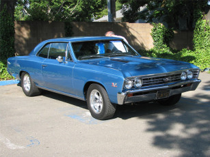 Картинка автомобили выставки уличные фото