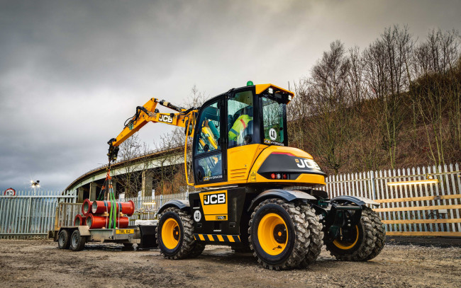 Обои картинки фото jcb 110w hydradig, техника, краны, jcb, 110w, hydradig, колесный, экскаватор, строительная, новый, погрузка, труб