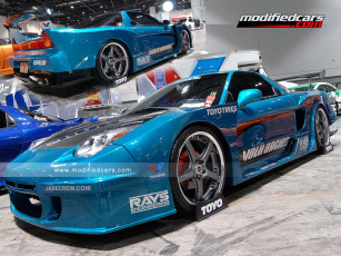 Картинка автомобили выставки уличные фото