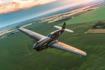 Картинка авиация боевые+самолёты полет истребитель p-40 warhawk