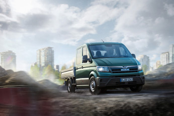 Картинка автомобили man зеленый грузовик город кучи