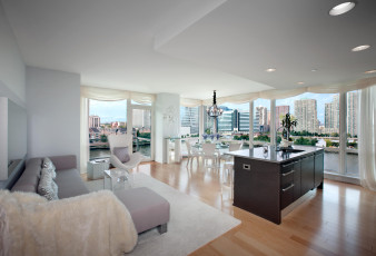 Картинка интерьер кухня дом мойка город небоскрёбы диван вид из окна столик