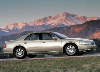 Картинка автомобили cadillac кадиллак серебристый горы