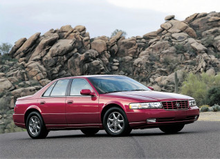 Картинка cadillac+seville автомобили cadillac кадиллак красный скала