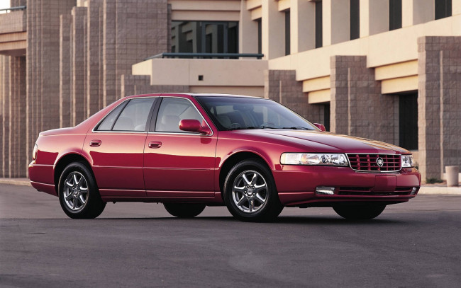 Обои картинки фото автомобили, cadillac, seville, красный, здание
