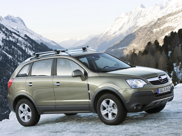 Обои картинки фото автомобили, opel, горы, оливковый, опель, снег, деревья