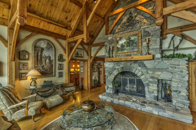 Обои картинки фото интерьер, гостиная, дизайн, лампа, столик, кресло, картина, камень, камин