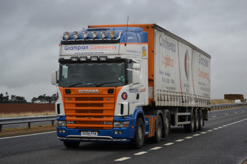 Картинка scania+164l автомобили scania+ выставка улица scania грузовые швеция ab судовые дизельные двигатели автобусы