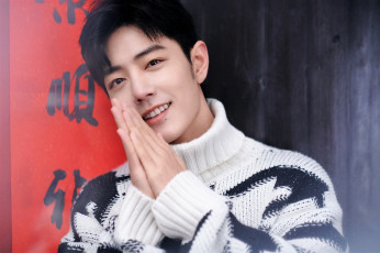 Картинка мужчины xiao+zhan актер свитер жест