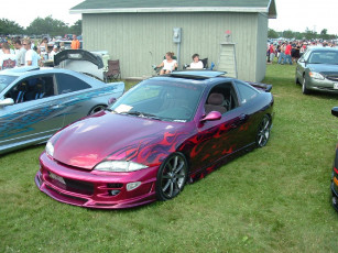 Картинка автомобили выставки уличные фото