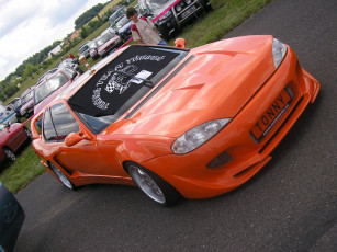 Картинка автомобили выставки уличные фото