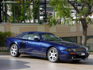 Картинка aston martin автомобили выставки уличные фото