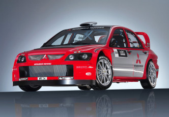Картинка mitsubishi+lancer+wrc04+2004 автомобили mitsubishi lancer wrc04 2004