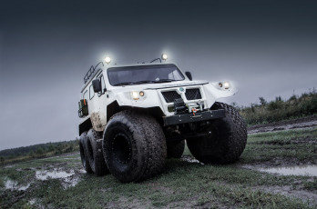 Картинка техника вездеходы болотоход трэкол 39294 российский плавающий шестиколeсный шины сверхнизкого давления