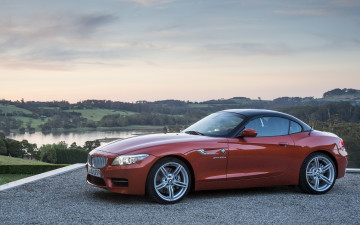 Картинка автомобили bmw бмв z4 красный площадка озеро деревья луга