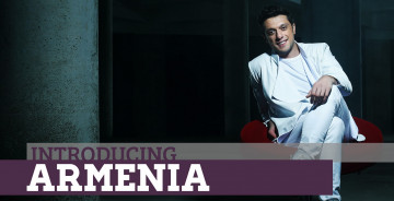 Картинка музыка евровидение стены костюм кресло улыбка певец армения арам