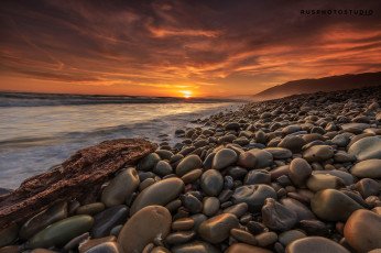 Картинка природа восходы закаты вечер солнце свет небо море берег камни