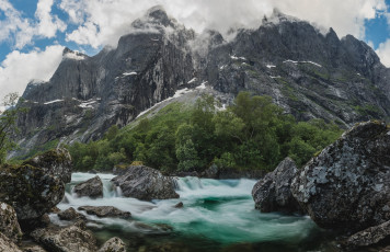 Картинка природа горы камни trollveggen rauma norway речка облака норвегия