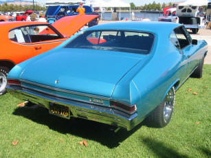 Картинка автомобили выставки уличные фото