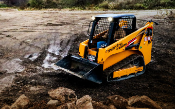 Картинка техника экскаваторы мустанг 1050pt гусеничный погрузчик строительная спецтехника