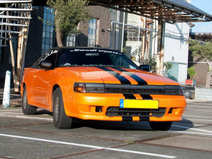 Картинка автомобили выставки уличные фото