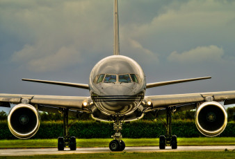 Картинка авиация военно-транспортные+самолёты самолет небо тучи кусты аэродром