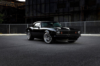 Картинка chevrolet+camaro автомобили camaro черный площадка забор здания