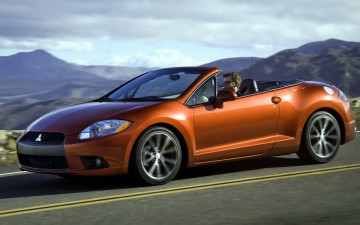 Картинка автомобили mitsubishi облака водитель небо горы дорога автомобиль