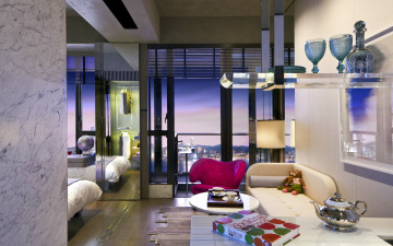 Картинка интерьер гостиная мягкий уголок книга