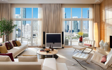 Картинка интерьер гостиная мягкий уголок кресла столик вазон