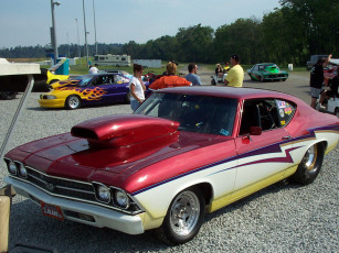 Картинка автомобили выставки уличные фото