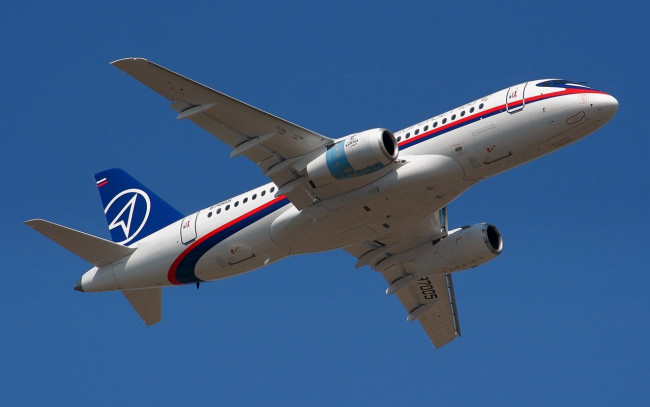 Обои картинки фото сухой, суперджэт, 100, авиация, пассажирские, самолёты