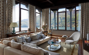 Картинка интерьер гостиная диваны кресла подушки