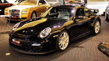 Картинка porsche 911 gt2 автомобили выставки уличные фото автомобиль стиль мощь скорость