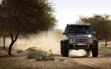 Картинка спорт авторалли mercedes-benz g63 amg 6x6 передок фары лого деревья