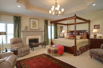 Картинка интерьер спальня камин кровать кресло